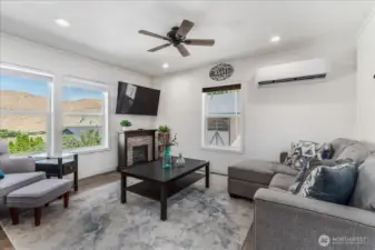 Living Room 2. Beautiful windows w/ 2" blinds.