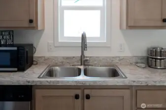Kitchen w/ Incredible Views and 2 inch blinds.