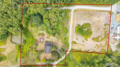 Nearly 4 acres with endless possibilities. Large-scale gardening, landscaping projects, or even creating a hobby farm.
