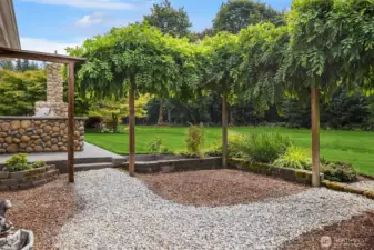 Mature landscaping abounds