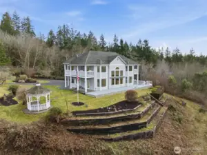 Terraced yard with fruit trees and lots of room for gardening