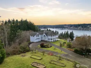 Looking towards the back of the home from 1.02 acre upper lot