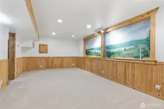 Basement living room- mural on the right is of Allyn
