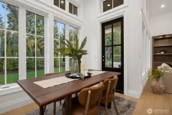 Black framed doors invite the expansive natural light in.