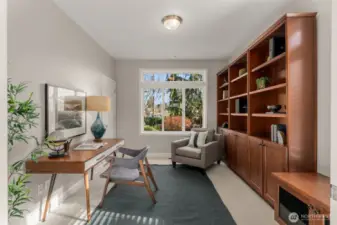 Flexible main-level bedroom ideal for multigenerational living, aging in place with a nearby ¾ bath, or the perfect guest suite or home office