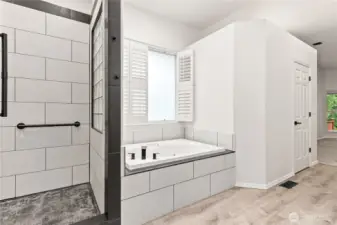 Primary bathroom - walk-in shower and jacuzzi tub