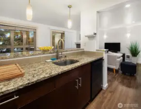 Open to the living room and dining area