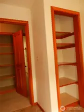 Extra storage in the hallway closet and closet in office area.
