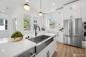 Chefs dream kitchen (staging and furniture are for decoration and not included in the sale of this home)