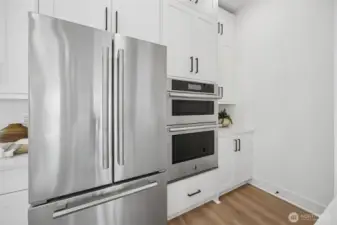 Chefs dream kitchen (staging and furniture are for decoration and not included in the sale of this home)