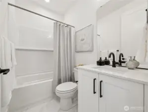 Hall Bath- Light and Bright. Staged