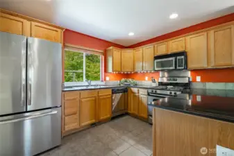 Looking at kitchen from kitchen eating area.