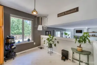 Looking from the breakfast nook into the spacious family room.