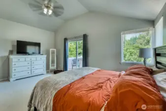 Looking to to the private balcony, the vaulted ceilings are a nice touch.