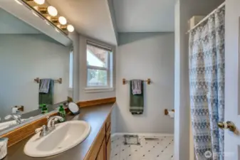 The primary suite 3/4 bath, very spacious and practical.