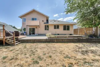 The large patio and elevated deck has endless possibilities.