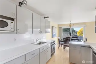 Complete with waterfall laminate countertop edges and retro appliances