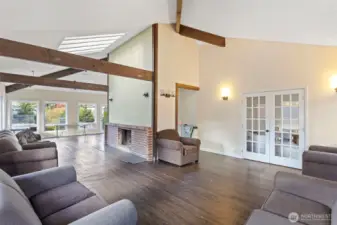 Entertaining areas, private meeting rooms and wood burning fireplace in clubhouse. Two outdoor patios, vaulted ceilings, and wood accents overlooking the pool area