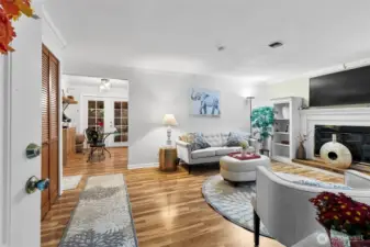 Formal living room with gas fireplace.