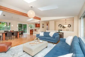 Main level is large with vaulted ceilings and skylights bathing the space in natural light.