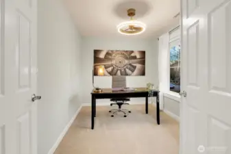 Private office with double doors to the right as you enter the house.