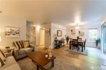 Living space and formal dining with lots of natural light.