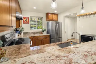 The dishwasher is new in 2025 and the refrigerator and hood vent are less than 3 years old