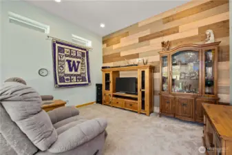 The next room down the hallway is a wonderful surprise! Call it an escape, call it a retreat, the previous owner called it his "man cave"!