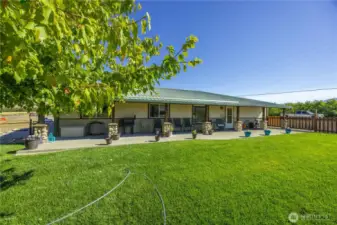 Relaxing on the West side of the house patio, on a warm day with a cool lemonade, enjoying the day as it comes to an end.....so rewarding and carefree!