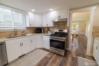 The updated kitchen offers plenty of counter space for those who love to entertain, or need to room to cook gourmet meals at home.