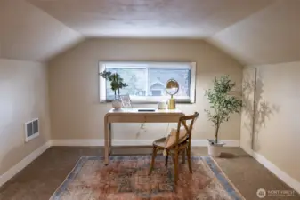 Upstairs also offers this area that could be used as a home office, gym space, additional storage, second living room - the options are endless!