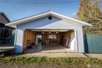 The large 2 car, detached garage is in wonderful condition and offers parking off the alley, storage, and extra flex space.