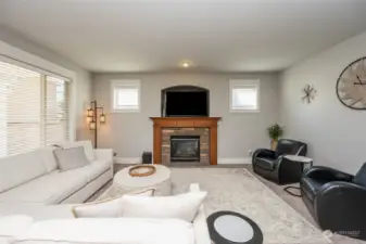 Family room off kitchen area. Enjoy the gas fireplace with beautiful wood stained mantel on those cooler days and nights