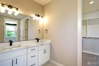 Dual vanities in the primary bathroom.