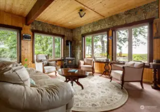 Cozy living room as you enter the home with a real fireplace for ambiance and extra warmth on a winter's Eve.