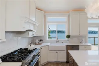 A delight for the master chef, a 6-burner gas stove, farm house sink and touchless Brizo faucet.