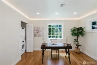 Another view of the office/den upstairs. A heat pump connected washer and dryer in the closet space for your convenience which will make doing laundry an easy task.