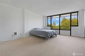 Generously sized primary bedroom.