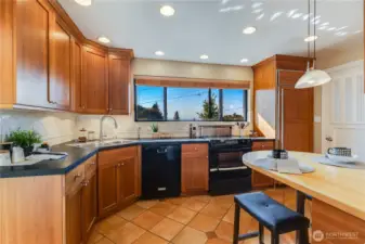 The kitchen features a smart layout for the home chef, with ample counterspace for creating meals.