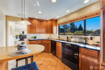 Notice the canned lighting and tile floors. Enjoy the kitchen as it is, or bring your plans to modernize it to your personal taste!