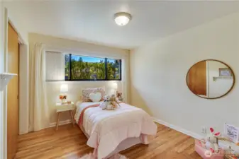 The second bedroom also looks over the front yard. Both main floor bedrooms feature a double closet with ample space for wardrobe and shoes.