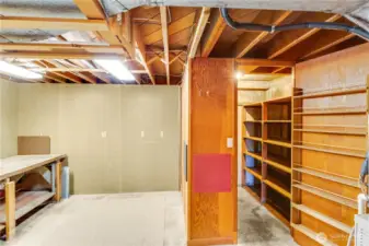 The corner storage can be redesigned as a wine cellar, or used to store canned goods, bulk food, or anything that requires a cool dry place.