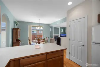 Kitchen with new dishwasher installed in July, hardwood floors and pantry.