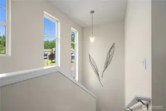 Beautiful bright windows on stairs.