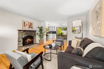 Cozy living room with gas fireplace and natural light