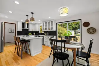 Kitchen opens seamlessly into dining space