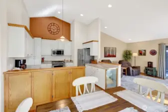 View from dining, open to kitchen and family room.