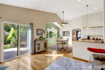 Slider door off family room to deck and beautiful gardens.