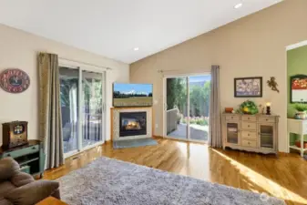 Two sliding doors off family room. One to the deck and one to the covered patio.