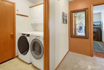 Laundry room with new washer.